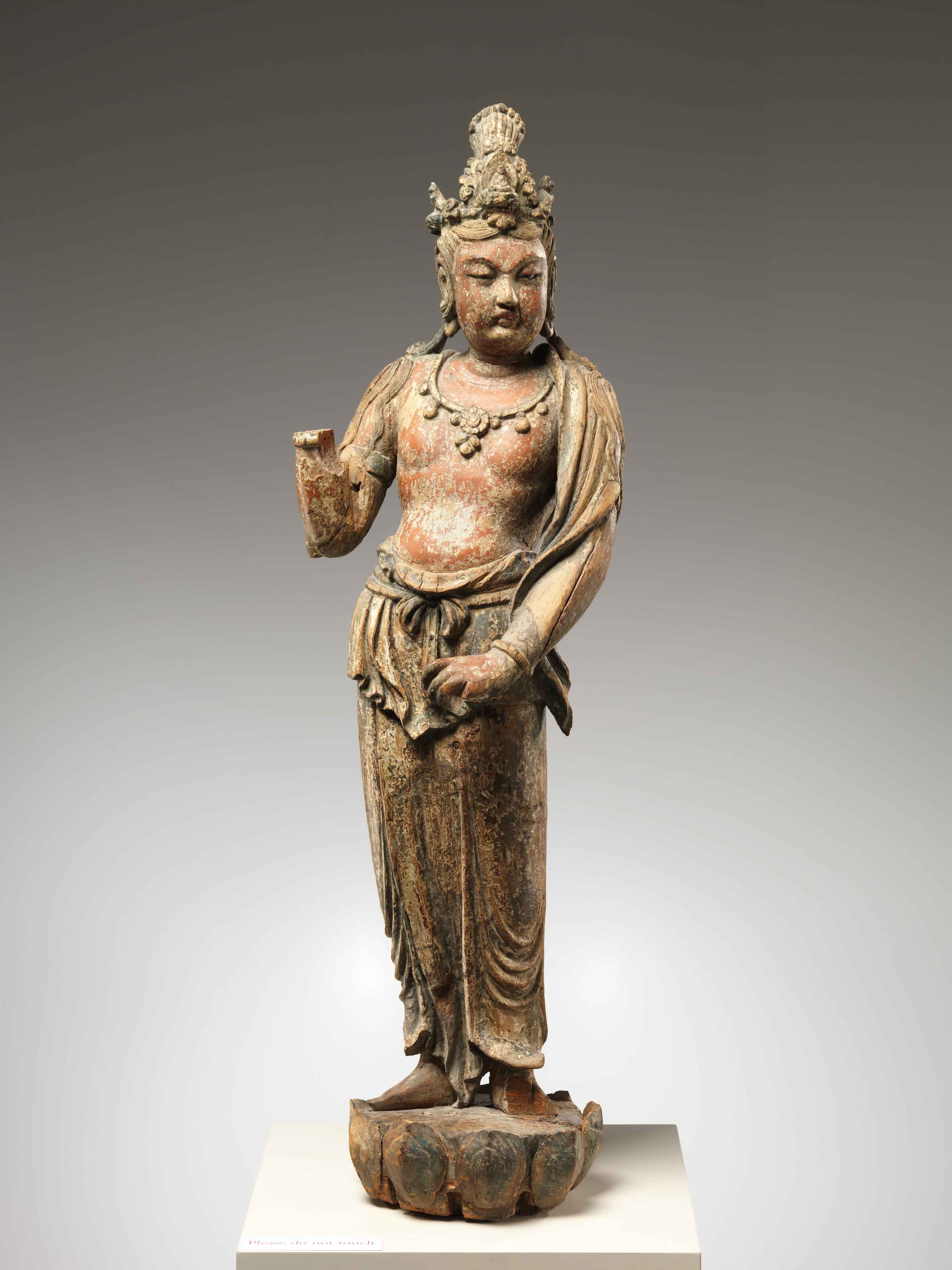 Bodhisattva Avalokiteshvara (Guanyin), 1282, China, Yuan dynasty (1271–1368), wood with traces of pigment, 39 1/4 in. (99.7 cm). The Metropolitan Museum of Art. Purchase, Joseph Pulitzer Bequest, 1934, 34.15.1a, b