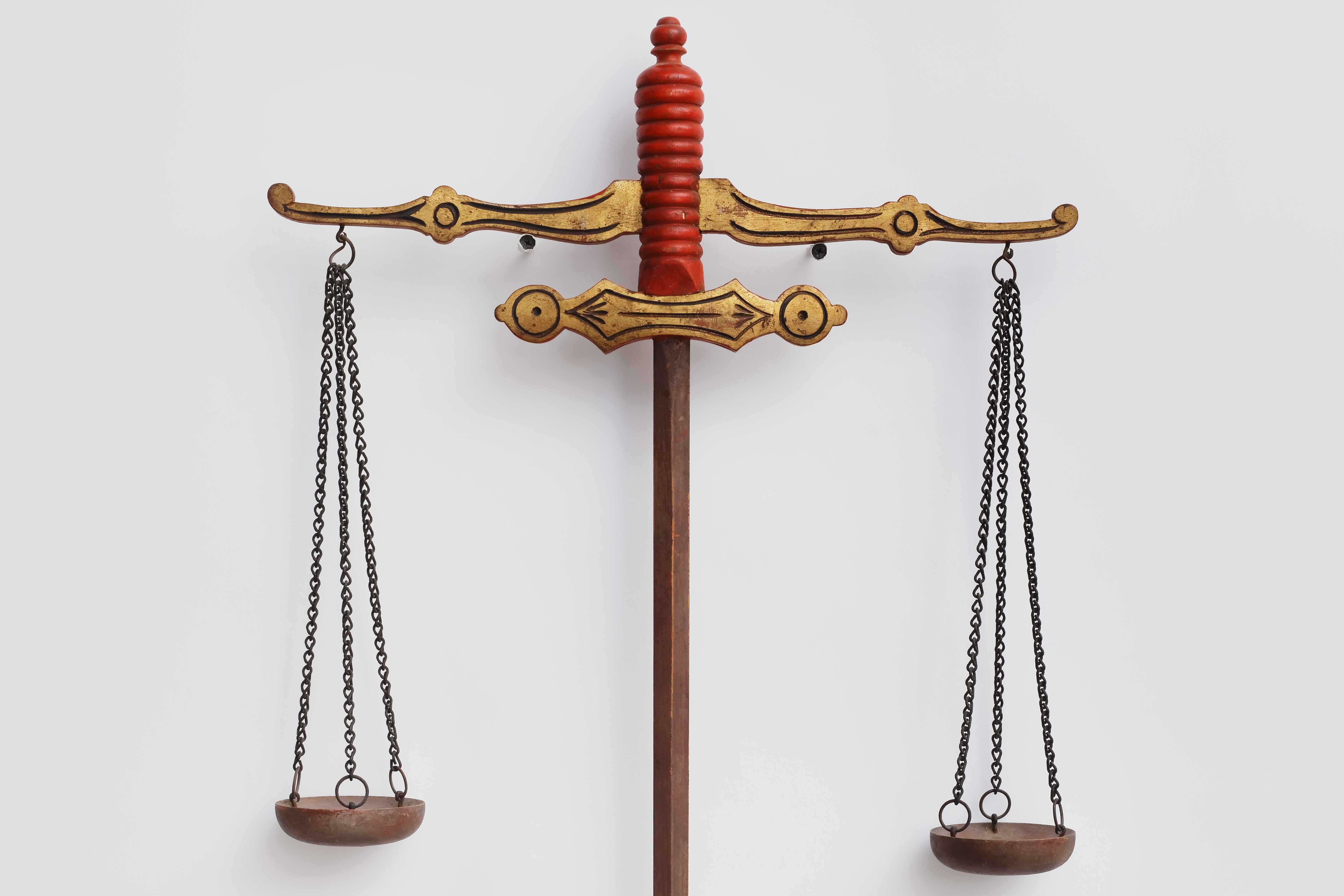 Independent Order of Odd Fellows Sword with Scales, detail, 1850–1900, paint and gold leaf on wood, with metal. Collection American Folk Art Museum, New York, Gift of Kendra and Allan Daniel, Photo by José Andrés Ramírez